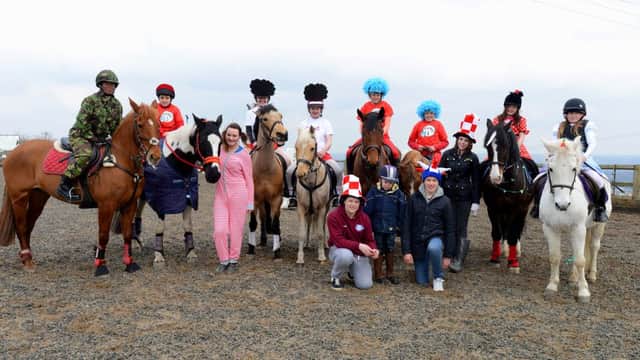 Children at a Hopton Horse Centre taking part in charity fancy dress events to raise money for Meningitis UK.  (d607a315)