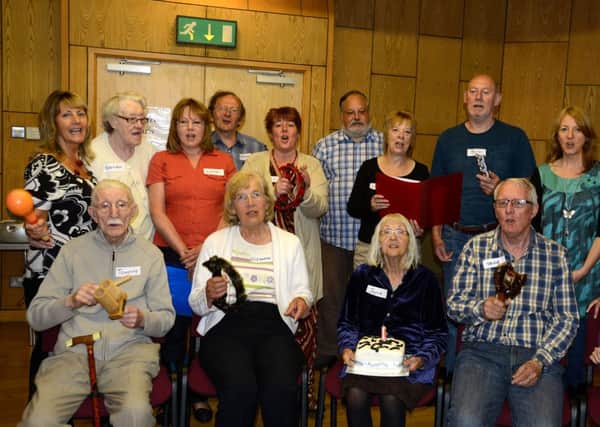 HIGH NOTE The Alzheimers Society singing group in Dewsbury. (d603a327)