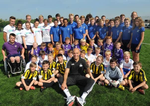 Howard Webb opens the new sports pitches at Bruntcliffe School.