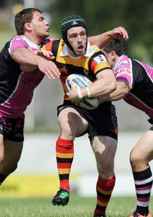 14th July  2013
Dewsbury Rams v York Knights RL.
Pictured Rams Adam O'Brien in the thick of the action.
Pictuire by Gerard Binks