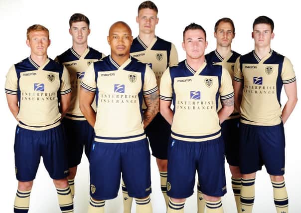 Leeds United players in the new away kit for 2013-14.