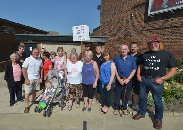 People protest against plans to close  Birstall toilets.