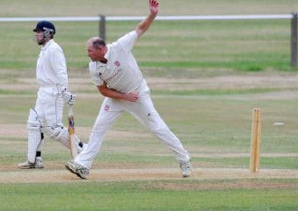 John Wood in action for Cleckheaton against Hanging Heaton.