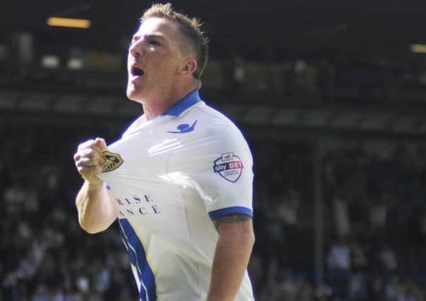 Ross McCormack celebrates opening the scoring for Leeds United against Brighton. Picture: IAN HARBER