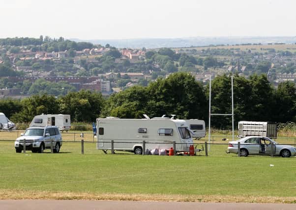 Travellers on playing fields used by Shaw Cross Sharks