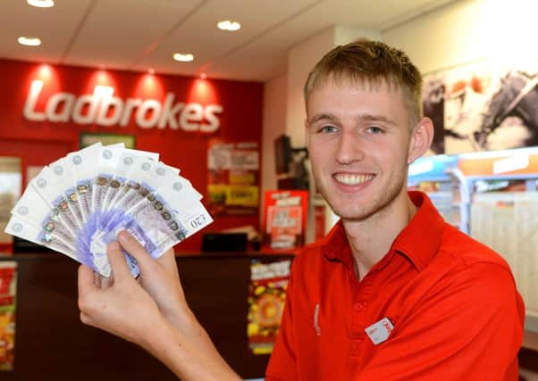 The Reporter Series fund will receive a £200 boost thanks to Ladbrokes in Mirfield. They offered an £80 bet on England to win the Ashes, Chris Singleton  with the winnings. (d621a336)
