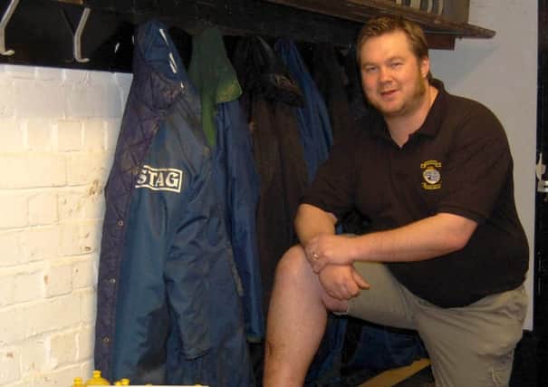 Wyke Rugby Club chairman Jason Whomack pictured inside the changing rooms which are threatened with demolision