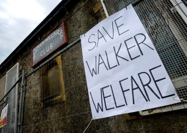 The council have issued an emergency demolition order on the Walker Welfare Centre. It's a disused community centre that locals have been trying to save. They are even willing to chain themselves to the fence outside when the bulldozers come. (D534F330)
