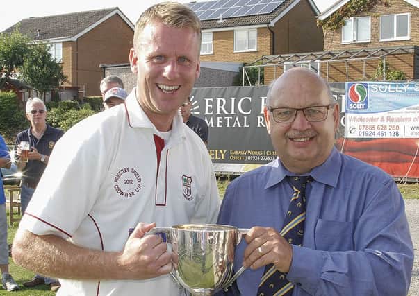 Woodlands 2nd team captain Steven Pearson receives the Crowther Cup.
Pic: Mike Baker JCT600 Bradford League