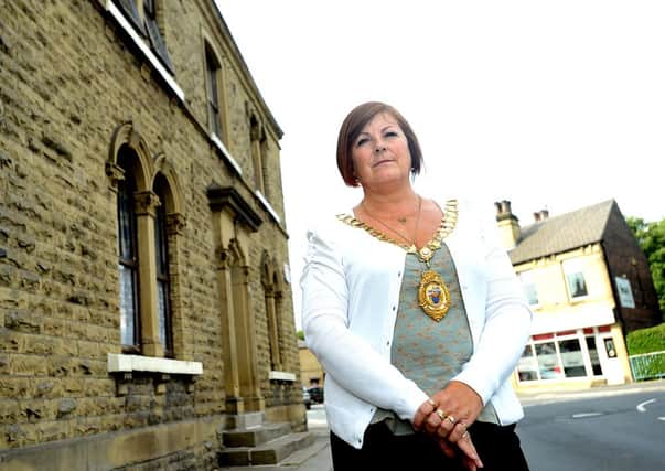 Outspoken councillor, Vivien Lees-Hamilton, is raising concerns over planning permission to knock down an old pub (currently bedsits to let) in Mirfield, and be replaced with eight homes in what she says is an already overcrowded area.
d310a337