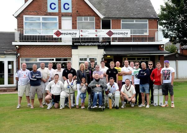 TOP TEAMS Former Dewsbury Celtic player David Roebuck, centre, with cricket players before the charity match.(d311f338)