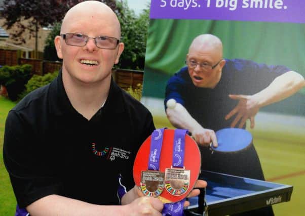 Table tennis player Howard Tomlinson has returned from the Special Olympics in Bath with several medals.  (d610b338)