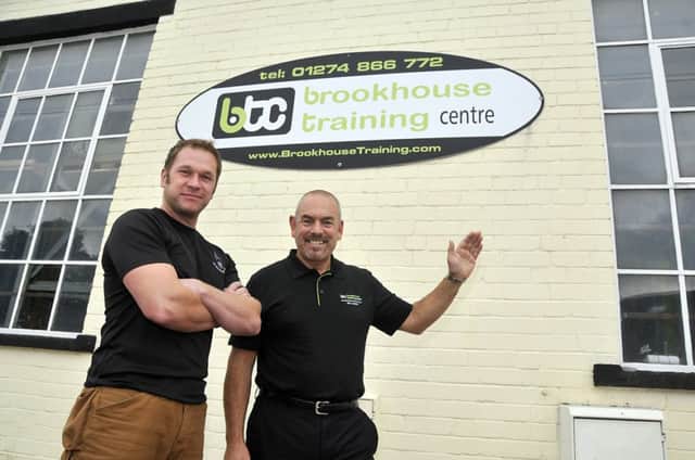 Military serviceman Steve Bond and Roy Parsk (right) Work Placement Officer, view the premises at Brookhouse Training Centre, Cleckheaton.