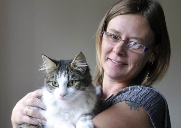 Nicola Wharton of Dewsbury Moor with her family pet cat Diesel that has been shot with a pellet on the Greenway in Dewsbury.