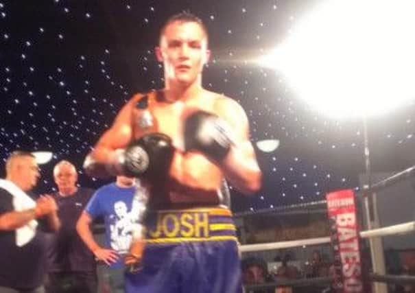 Josh Warrington with the English featherweight belt after victory over Ian Bailey.