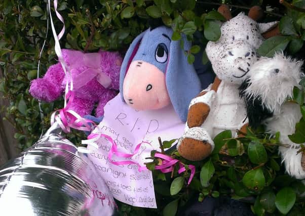 Tributes left at the scene of the baby's death.