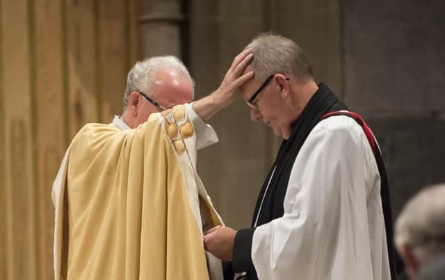 New role: The Rev Canon Kevin Partington is installed as Rural Dean by the Venerable Peter Townley.