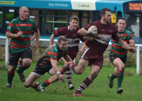 Thornhill's Ben Kendall gets away from the Keighley defence.