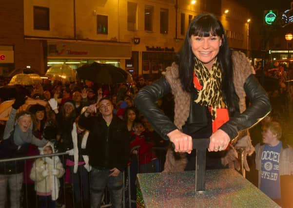 Emmerdale's Lucy Pargeter (Chas Dingle) turned on the town's Christmas lights last year. (D510U248)