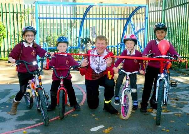 Mayor of Kirklees (Martyn Bolt) officially opened Thornhill J & I School's new bike shelter. The Mayor with some of the school's pupils. (D542B343)