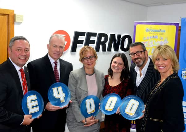 FIRM FOUNDATION Ferno  Md Jon Ellis, Jo Ryan, Alan Clark and Margaret Merkle from Ferno with Town's Sean Jarvis and Mandy Taylor. (d603a344)