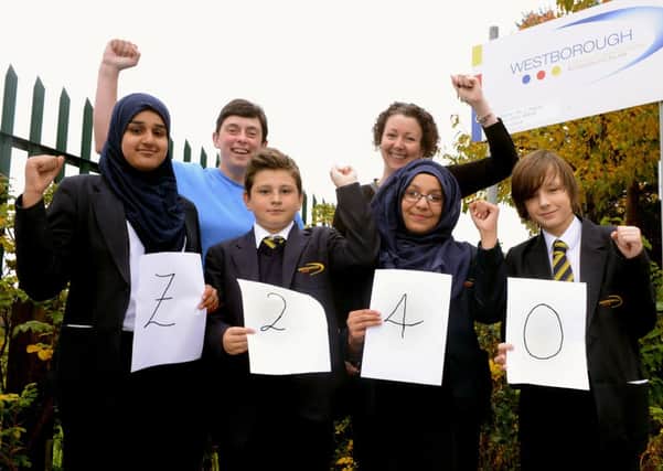 Westborough High School pupils have raised £240 for the Reporter Series Fund with a sponsored walk, pictured are pupils Juwariah Altaf, Matthew Widdop, Hinaa Khalil and Conner Wilkinson with Karen Leaney  and  Gayna Goalby. (d612a334)