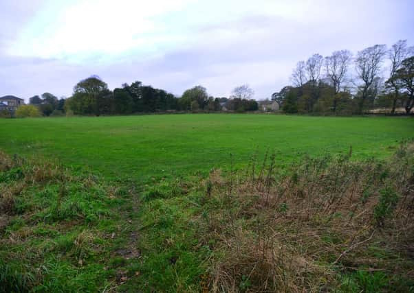 Wellhouse Lane in Mirfield - Playing fields where a community centre may be built. (D534B345)