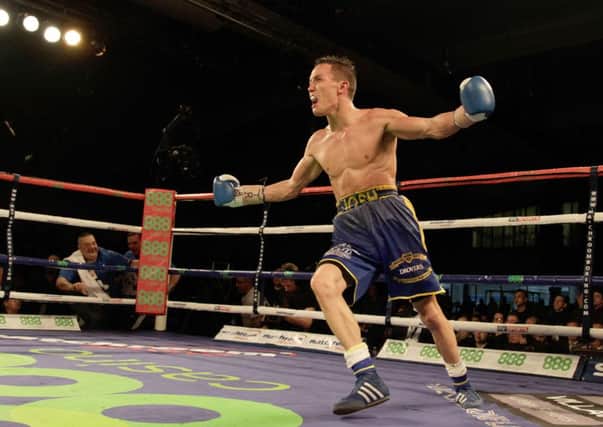 Josh Warrington shows his delight after stopping Samir Mouneimne to win the Commonwealth title. Pic: Richard Sellers/PA Wire.