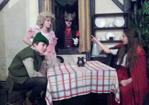 FAIRYTALE FUN Dewsbury Arts Group youth members Freddie Purdy, Megan Wright, Matthew Bailey and Millie Collins in rehearsals for Red Riding Hood and Robin.