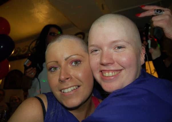 Charlotte Akroyd and Claire Ivinson-Beveridge shaved their heads for charity