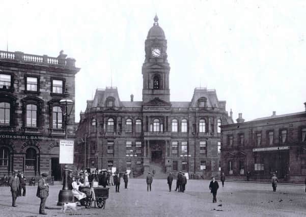 This photograph clearly shows how quickly Dewsbury town centre developed once the town hall was built. The building on the right is the Yorkshire and Lancashire Railway station, which is long gone but the town hall still remains unchanged..