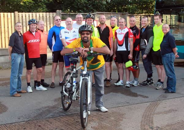 TWO WHEELS Arriva drivers switched buses for bikes. Pictured front is  Dewsbury driver Leroy Jackson.