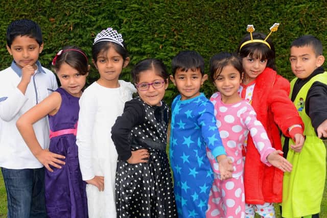 Savile Town Infant and Nursery School will be raising money for Children in Need by wearing their pjs or favourite party outfits to school for a Dress Up, Dress Down fundraiser. (d604a347)