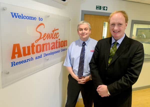MP Simon Reevell visited Sewtec Automation Ltd to open the new research and development department. He is pictured with Gary Robinson.