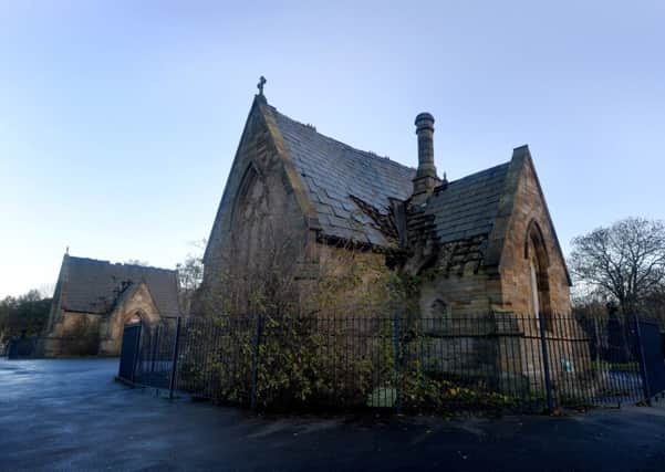 Two council owned listed chapels at the top of Dewsbury cemetary which have been left to fall into disrepair. (D531L347)