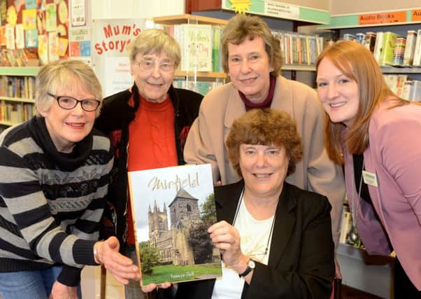 Author Frances Stott wrote a book about Mirfield , it has raised £8,000 for four charities - Heather Fielden from Yorkshire Cancer Research, Emily Kennedy from Kirkwood Hopsice, Elizabeth Hewson from British heart Foundation and Margaret Leach from Diabetes UK.  (d611a348)