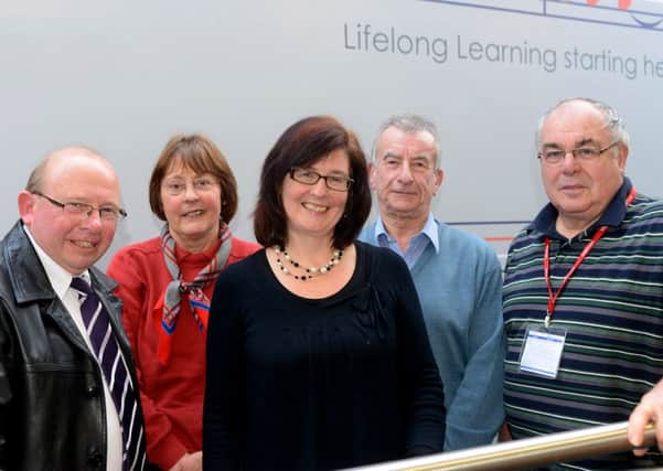 Community members Stuart Hartley, David Horsman, Ann Roberts and Bill Beattie have written a book called Transforming Thornhill Lees, also pictured is (centre) Kim Strickson Community Heritage Manager. (d612b348)