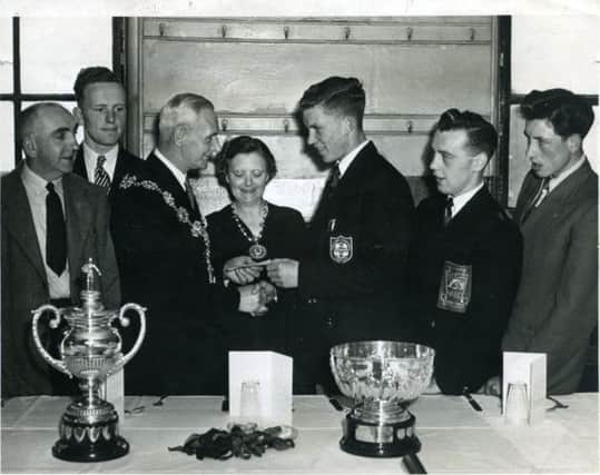 Nostalgia - Pictured at Shaw Cross Boys Club receiving special awards in 1952 after playing for England against Wales are: Mick Sullivan, David E Smith and Austin Kilroy. Also pictured are; the Mayor and Mayoress, Coun and Mrs R S Roberts, Mr F Smith, chairman of the club, and Douglas Hird, secretary. Coun Roberts, who later became an alderman, was president of the club for many years.