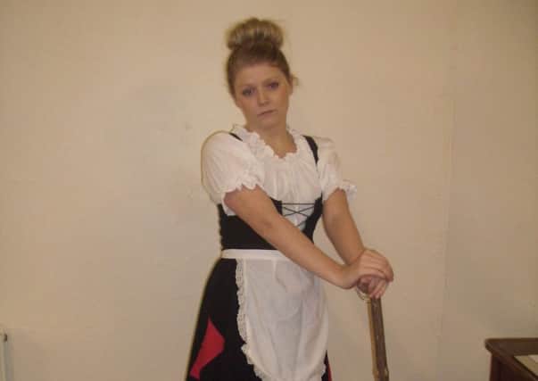 DRESSED DOWN Cinders, played by Hayley Thompson, needs a dazzling gown or she can't go to the ball.