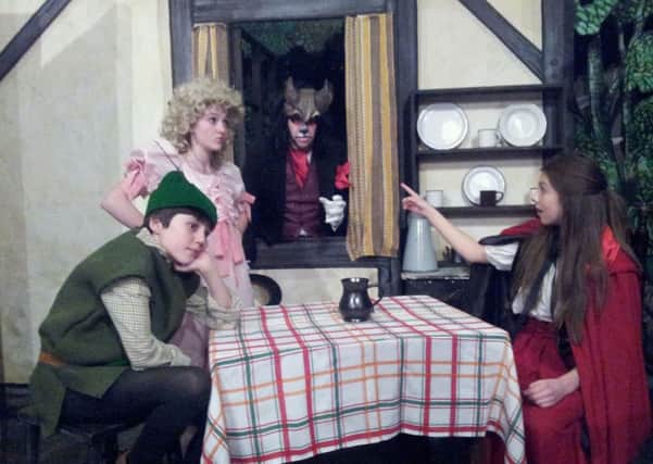LOOK OUT! Robin (Freddie Purdy), Goldilocks (Megan Wright), Uncle Charlie (Matthew Bailey) and Red Riding Hood (Millie Collins).