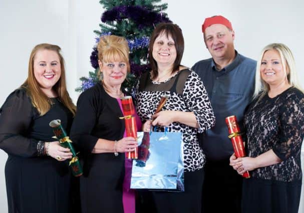 From the left Jodi Stapylton, Margaret Bingham and lottery winners  Amanda Nield and Graham Nield and Andrea Edwards
