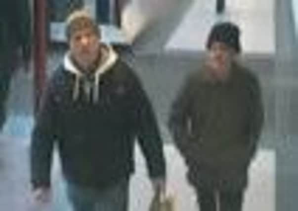 POLICE APPEAL Robert Edward Hind, right, with a man at Huddersfield Bus Station on Wednesday December 11.