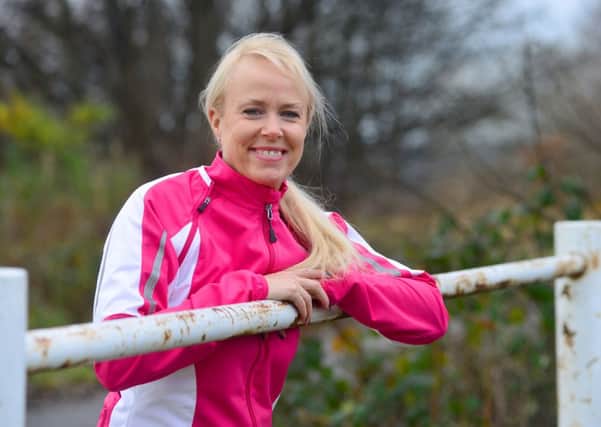Alison wood is running two miles a day for 125 days to raise money for cancer research. (D521E350)
