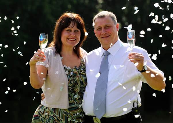 AUGUST Graham Nield and Amanda Vickers scooped £6.6m on the Lottery.