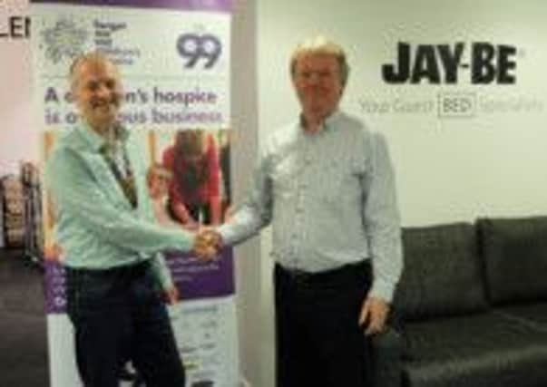 THANK YOU Forget Me Nots Ian Leedham with Jay-Be managing director Stephen Durrans.