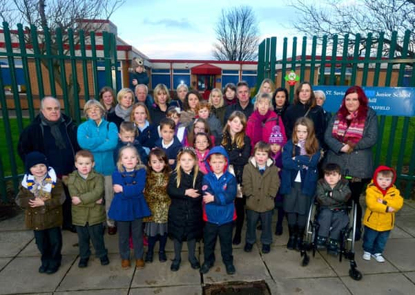 Parents of pupils at Brownhill St Saviour's Junior School are angry over the proposed school name change after it was announced it will merge with the infants school.