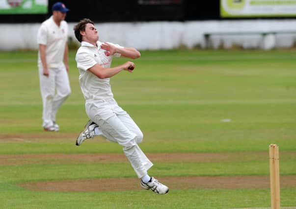 Scotland and Yorkshire fast bowlers Iain Wardlaw in action for Cleckheaton