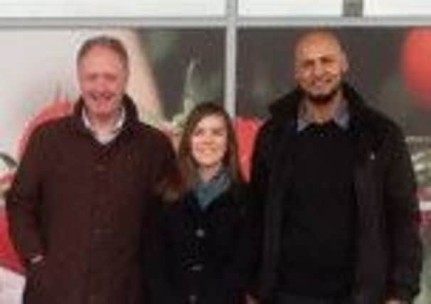 Shehzad Hussain, left, with Dewsbury MP Simon Reevell and former candidate Beth Prescott