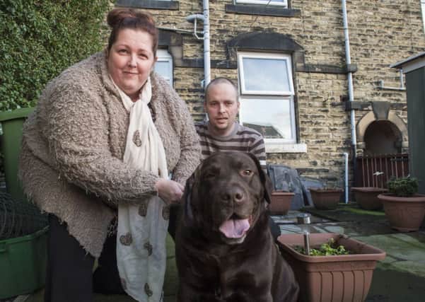 Picture by Allan McKenzie/AMGP.co.uk - Rochelle Ingham Dog Attack - Heckmondwike, England - 190214 - Rochelle Ingham with Chris Butler & Max.