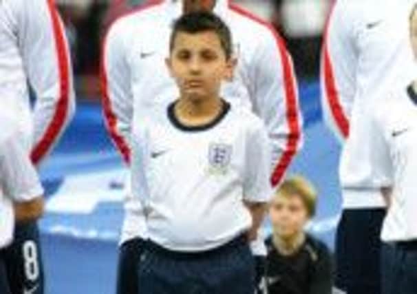 Adam Laher walked out at Wembley with the England team.